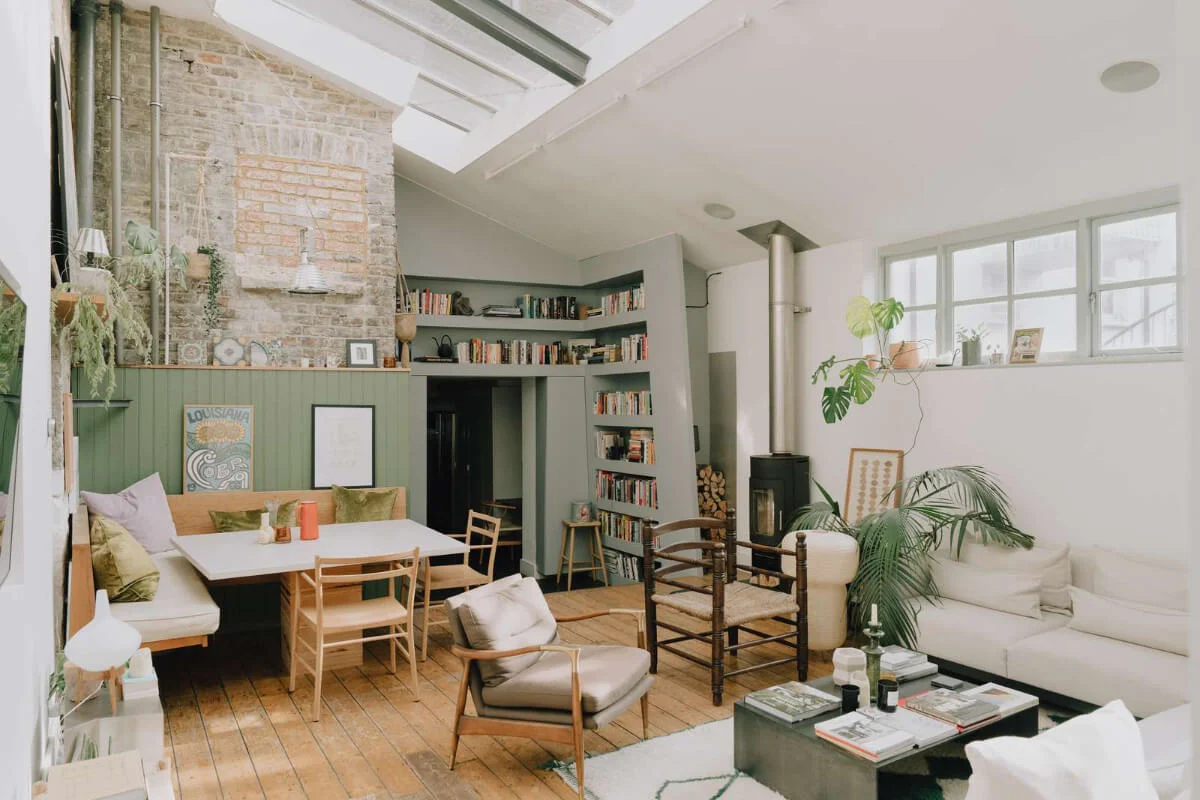 A converted loft living room with skylight